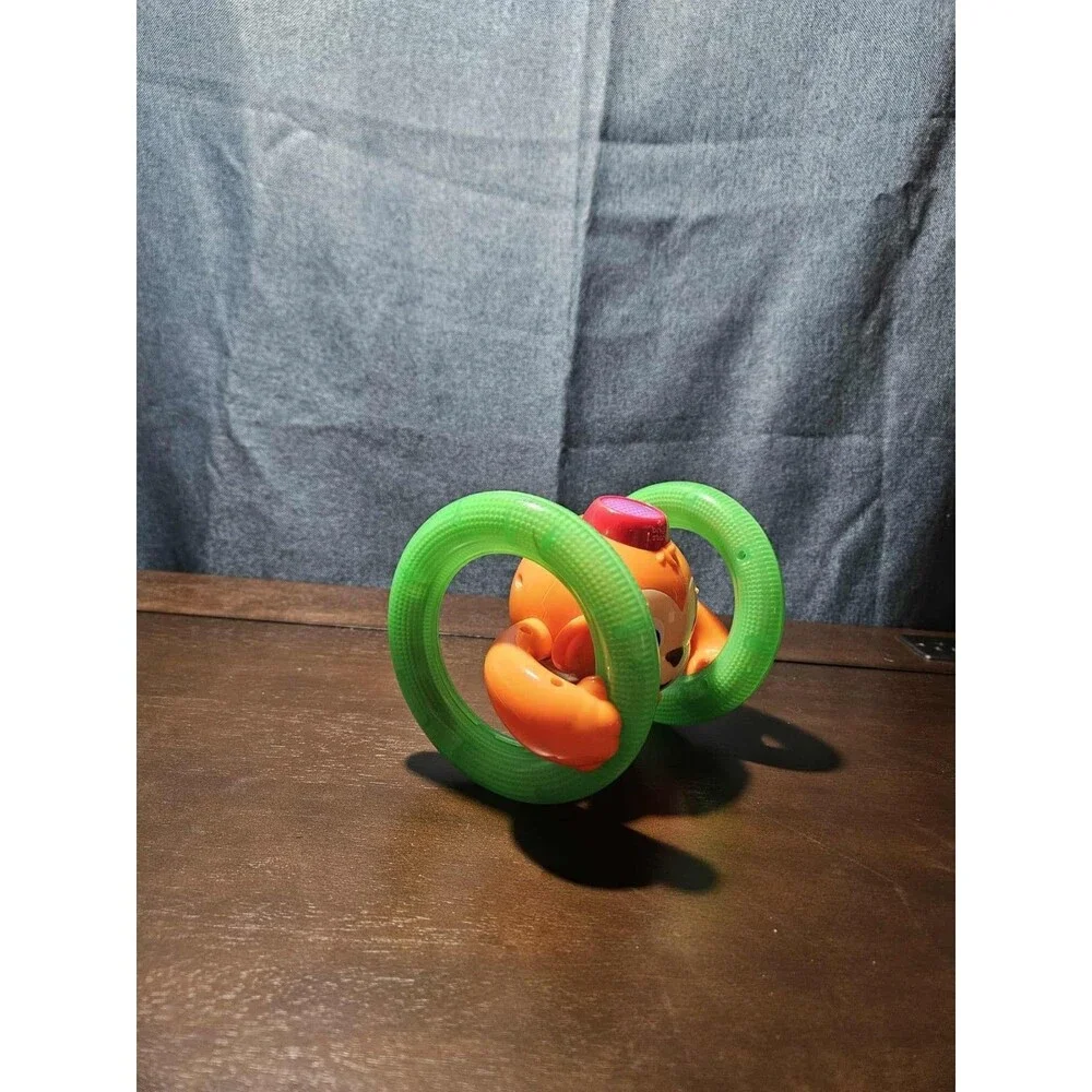 Bright Starts Roll & Glow Monkey | Musical Light Up Crawl Toy | Tummy Time Toy